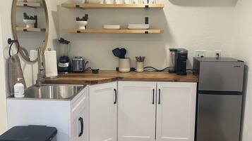 Fridge, microwave, stovetop, coffee/tea maker