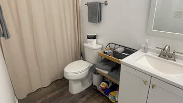 Hair dryer, towels, soap, shampoo