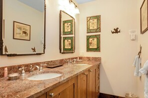 Shower, hair dryer, towels, shampoo