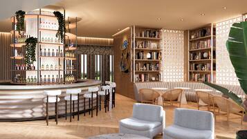 Zona bar moderna con un bancone circolare, sgabelli da bar e una libreria piena di libri e oggetti decorativi.