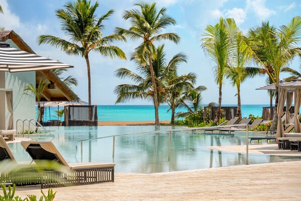 3 outdoor pools, open 7:00 AM to 6:30 PM, pool umbrellas, pool loungers - Secrets Playa Esmeralda Resort & Spa - Adults Only - All Inclusive (Miches)