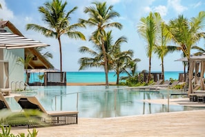 3 outdoor pools, open 7:00 AM to 6:30 PM, pool umbrellas, pool loungers