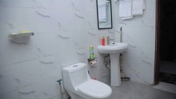 Shower, towels, soap, shampoo