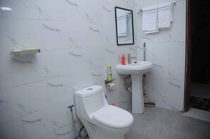 Shower, towels, soap, shampoo