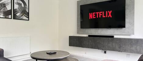 Apartamento | Área de estar | TV