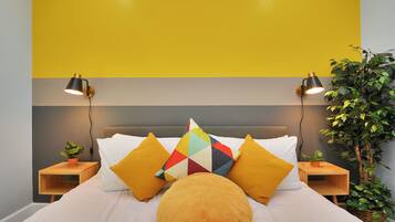 Individually furnished, desk, laptop workspace, iron/ironing board