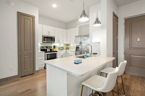 Fridge, microwave, oven, stovetop - Tropical Dream 2BR/2BA w./ Pool, Gym, and Theater (Naples)