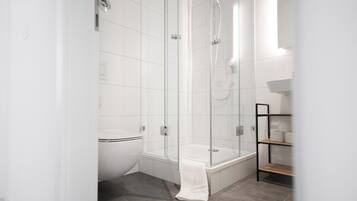 Shower, eco-friendly toiletries, hair dryer, towels