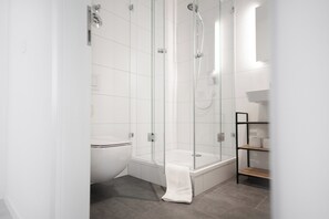 Shower, eco-friendly toiletries, hair dryer, towels