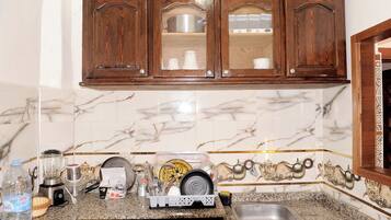 Réfrigérateur, four, plaque de cuisson