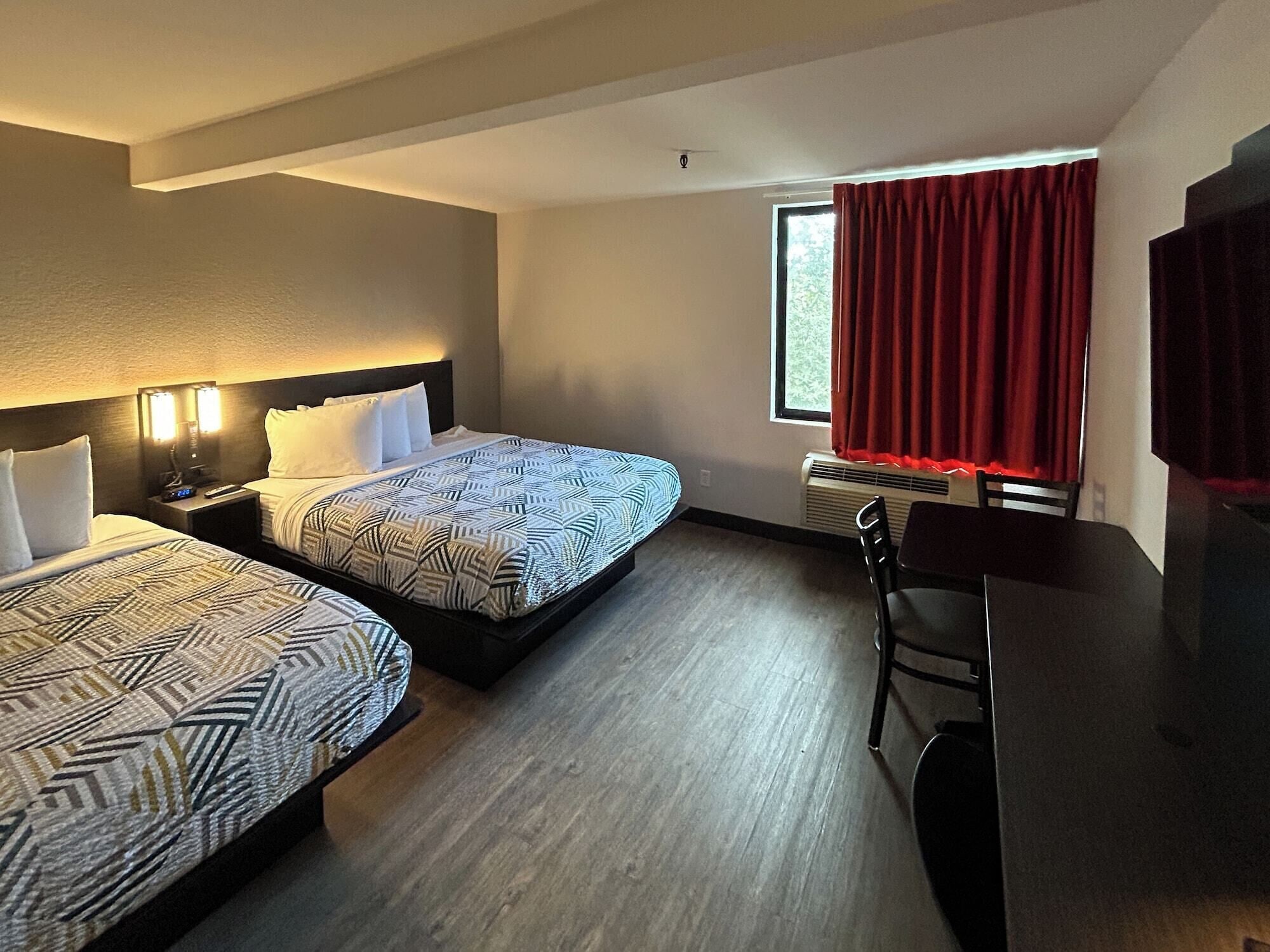 Desk, blackout drapes, free WiFi, bed sheets