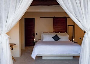 Deluxe Suite, Pool View | Premium bedding, down duvets, minibar, in-room safe - Beachfront Hotel Boutique DK (Isla Holbox)