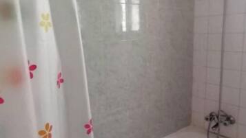 Jetted bath, towels, soap, toilet paper