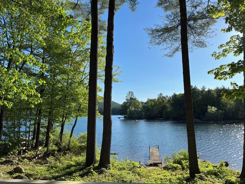 Charming lakefront 2-bedroom cottage with private beach & dock.