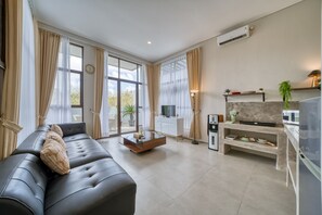 Family Villa, Balcony | Living area | Flat-screen TV