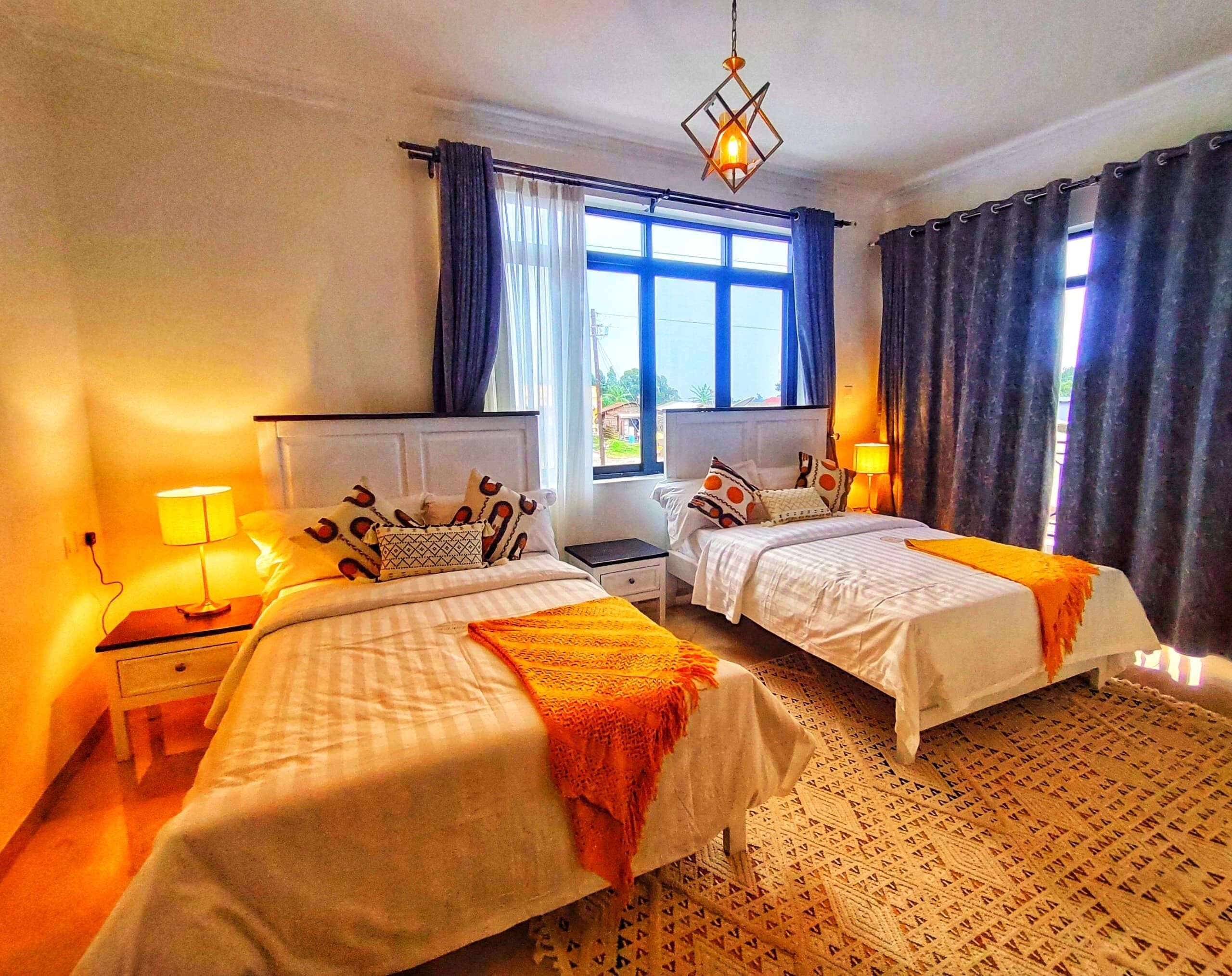 Habitación Deluxe con 2 camas individuales | Caja de seguridad en la habitación y wifi gratis 