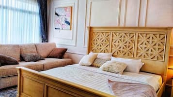 Kahden hengen deluxe-huone, 1 suuri parisänky | Tallelokero huoneessa, ilmainen Wi-Fi