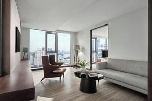 1-Bedroom City View Flat with Living Room | Living room | TV - Signature By M Village Le Thanh Ton (Ho Chi Minh City)