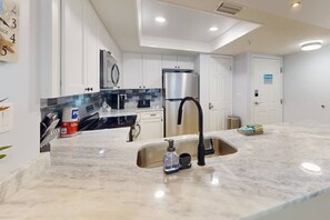 Fridge, microwave, dishwasher, coffee/tea maker