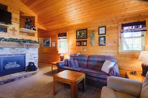 TV, fireplace - Shawano Lake Cabin w/ Boat Dock! (Cecil)