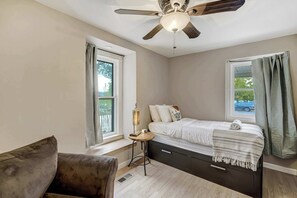 4 bedrooms, desk, iron/ironing board, travel cot