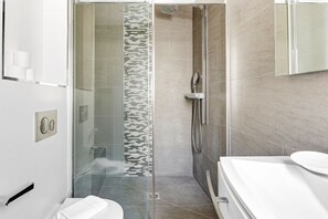 Shower, hair dryer, towels, soap