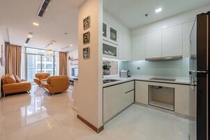 Family Suite, 3 Bedrooms, Club Lounge Access, City View | Private kitchen | Full-size fridge, microwave, oven, stovetop