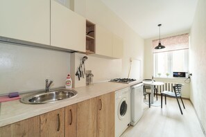 Fridge, microwave, cookware/dishes/utensils, spices - A small and very cozy one-bedroom apartment in the very center of Minsk. (Minsk)