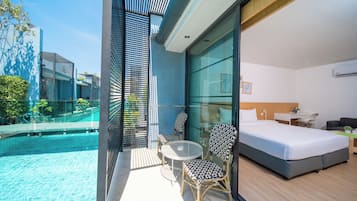 Deluxe Pool Access | Pillowtop-Betten, Zimmersafe, individuell dekoriert, Schreibtisch