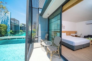 Deluxe Pool Access | Pillowtop beds, in-room safe, individually decorated, blackout drapes