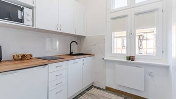 Studio | Een strijkplank/strijkijzer, gratis wifi