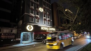 A hotel named "Royal Capital" with a prominent sign and a large illuminated logo. - Royal Capital Hotel Thermal & SPA (Bursa)