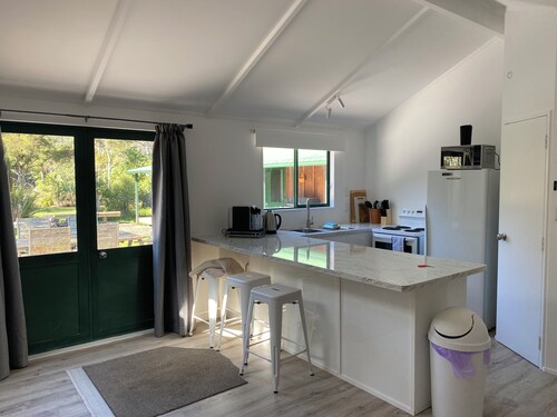 Close to the river, 11 TeAho  is 
a family lodge with plenty of character 