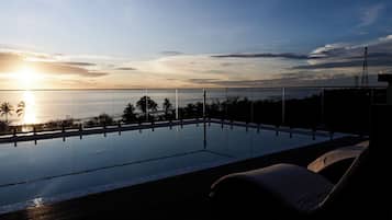 Outdoor pool, pool umbrellas, pool loungers