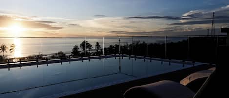 Outdoor pool, pool umbrellas, pool loungers