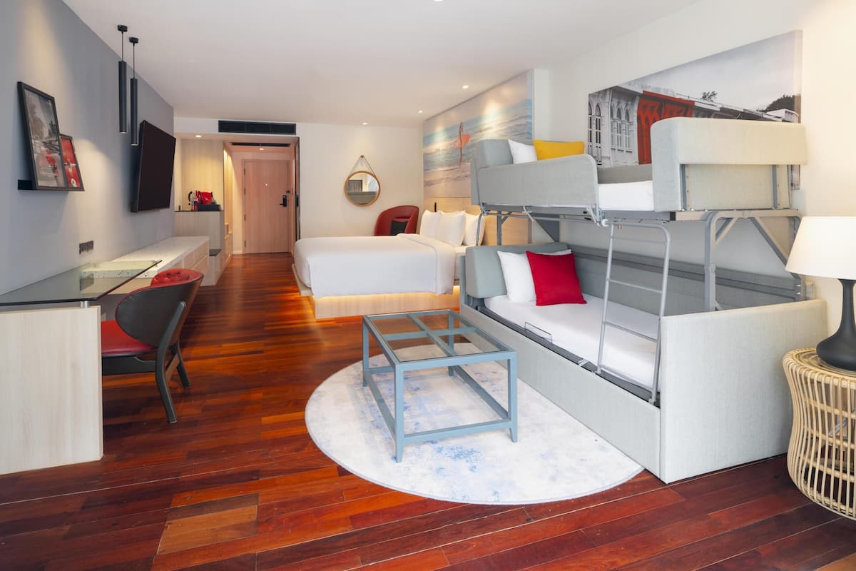 Family Room | Premium bedding, minibar, in-room safe, individually decorated
