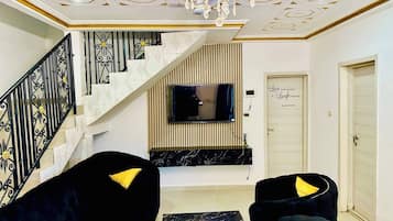 Villa, 3 habitaciones, para fumadores, balcón | Área de sala de estar