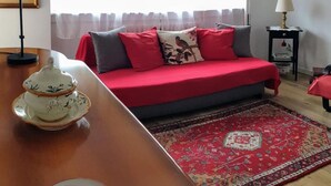 Departamento, 2 habitaciones, para fumadores, balcón | Área de sala de estar