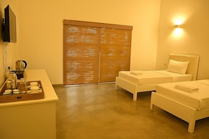 Habitación triple Deluxe | 1 habitación y wifi gratis