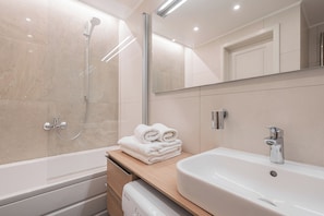 Hair dryer, bidet, towels, soap
