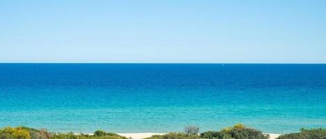 On the beach, sun loungers