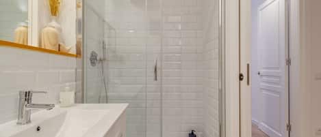 Hair dryer, towels, soap, shampoo