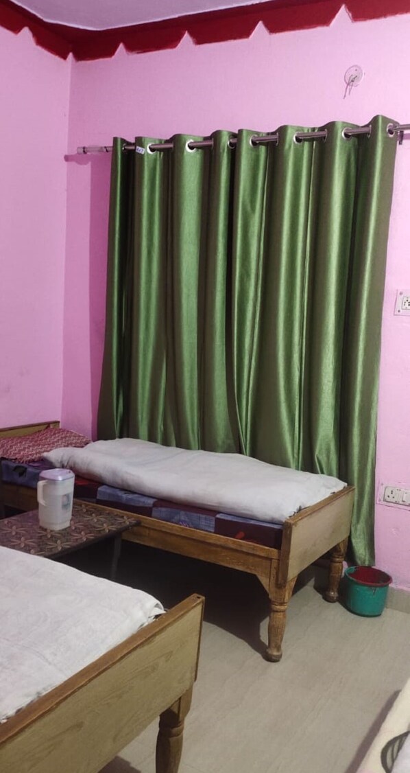WiFi (free), bed sheets - Goroomgo Shiv Kailash Barkot (Rajgarhi)