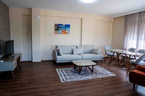 Deluxe Condo, Balcony, Mountain View | Living area | 106-inch TV with cable channels - Lara Breeze Homes (Antalya)