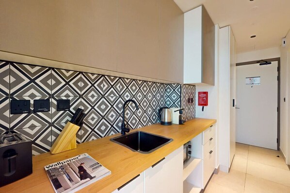 Fridge, microwave, coffee/tea maker, toaster