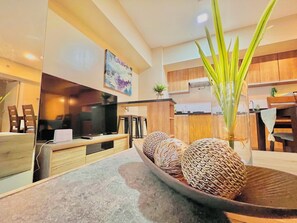 Signature Condo, 1 Bedroom, Non Smoking, Balcony | Living room | 45-inch Smart TV with cable channels - Avida Towers Atria (Iloilo)