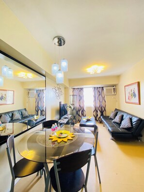 Family Condo, 1 Bedroom, Balcony, Poolside | In-room dining - Avida Towers Atria (Iloilo)