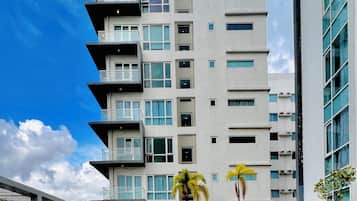 Enjoy a unique view from the balconies, with clean lines and large windows framing the surrounding area.