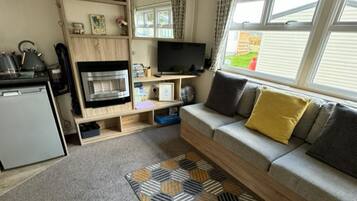 Chalet | Living area | Flat-screen TV, fireplace, DVD player