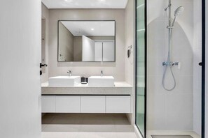 Shower, hair dryer, towels